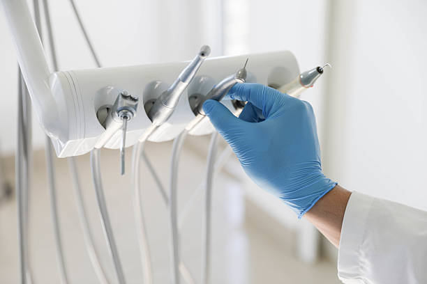 Professional Emergency Dentist technician working in Dent, OH